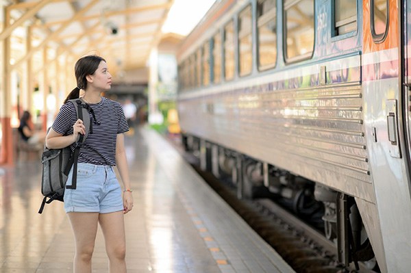 Girl Traveling in Train Station